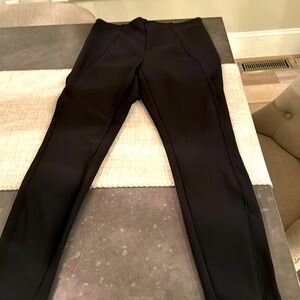 Black size medium Christian Siriano dress pants with zipper accents.